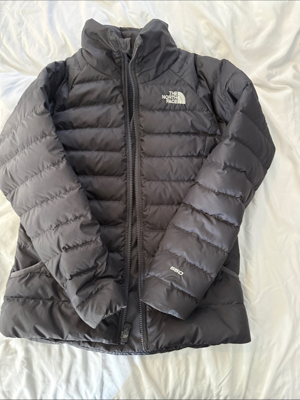 The North Face girl’s Black Puffer Jacket - 550 Fill